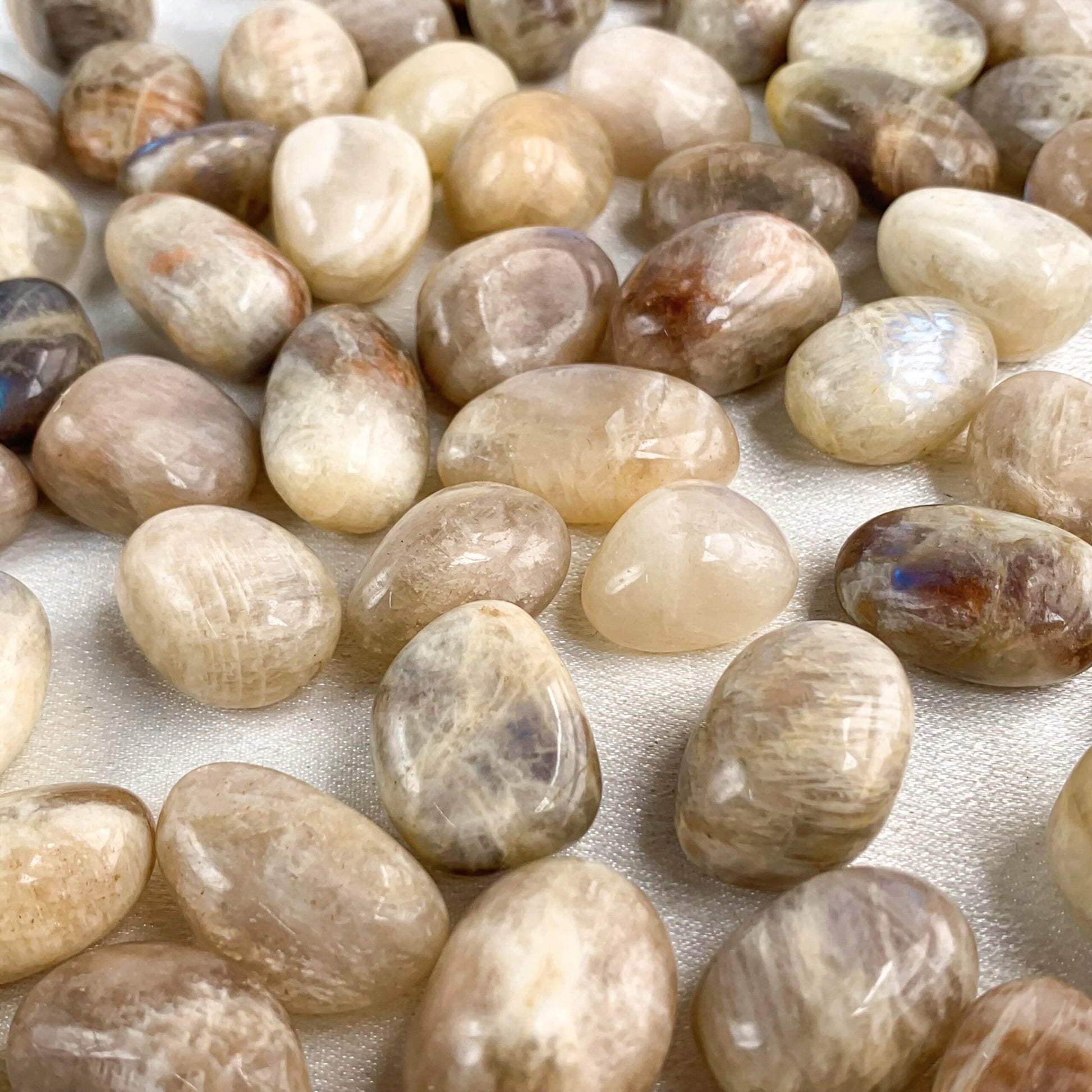 Peach Moonstone pocket gems, promoting intuition, emotional balance, and positive energy.